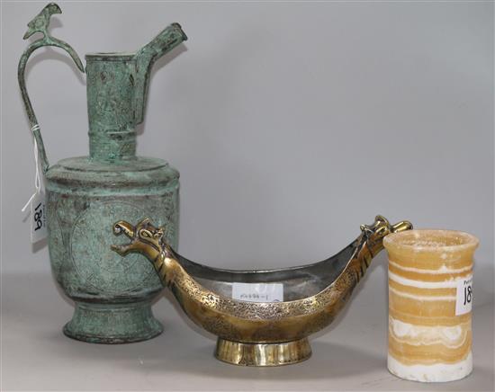 An Islamic bronze ewer, a bronze incense burner and an alabaster vessel